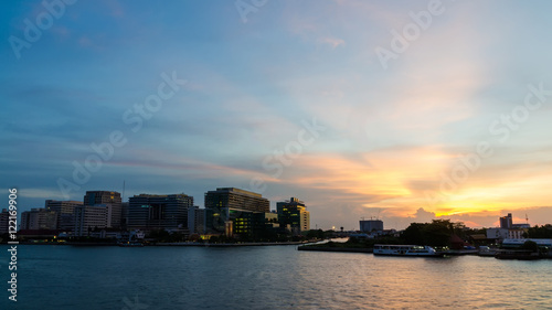 Hospital waterfront evening light. © noumnano