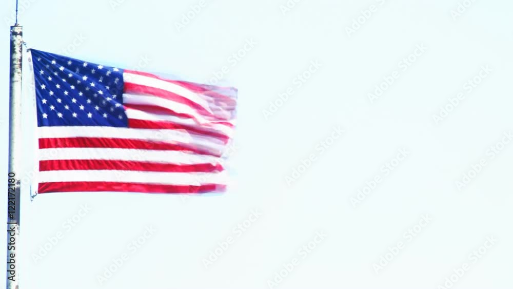A high contrast US flag waving over a white background. A high contrast US flag waving over a white background.