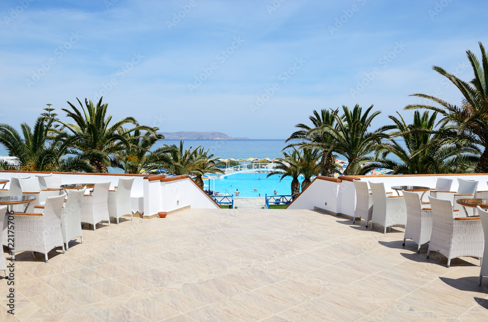 Swimming pool and beach at luxury hotel, Crete, Greece