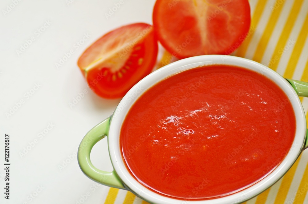 Bowl of tomato sauce on white background with soft focus. Bowl of tomato sauce on white background with soft focus.