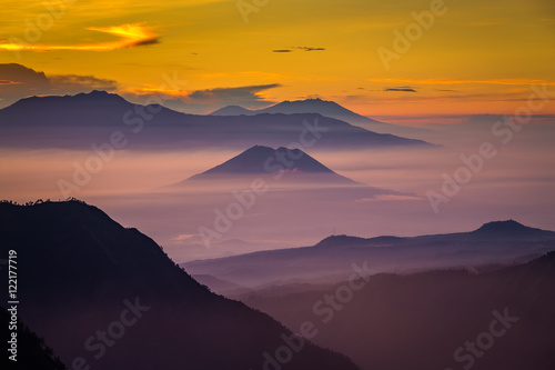 Layer of mountains and mist at sunset time  Landscape