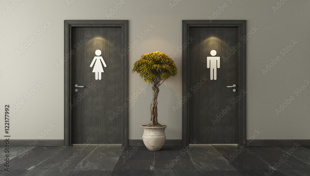 black restroom doors for male and female genders with spot light Stock