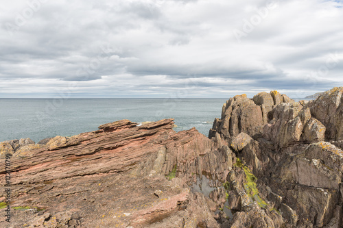 James Hutton's famous angular unconformity at Siccar Point in Berwickshire, Scotland. Gently dipping Devonian sandstone overlying near-vertical Silurian greywacke.