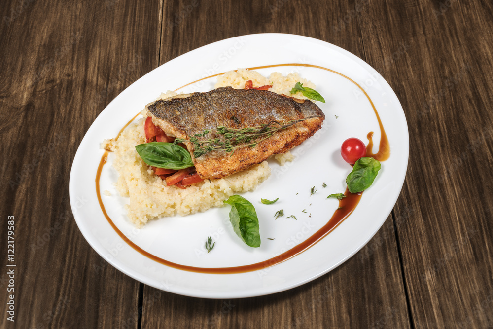 Roasted dorado fish with couscous