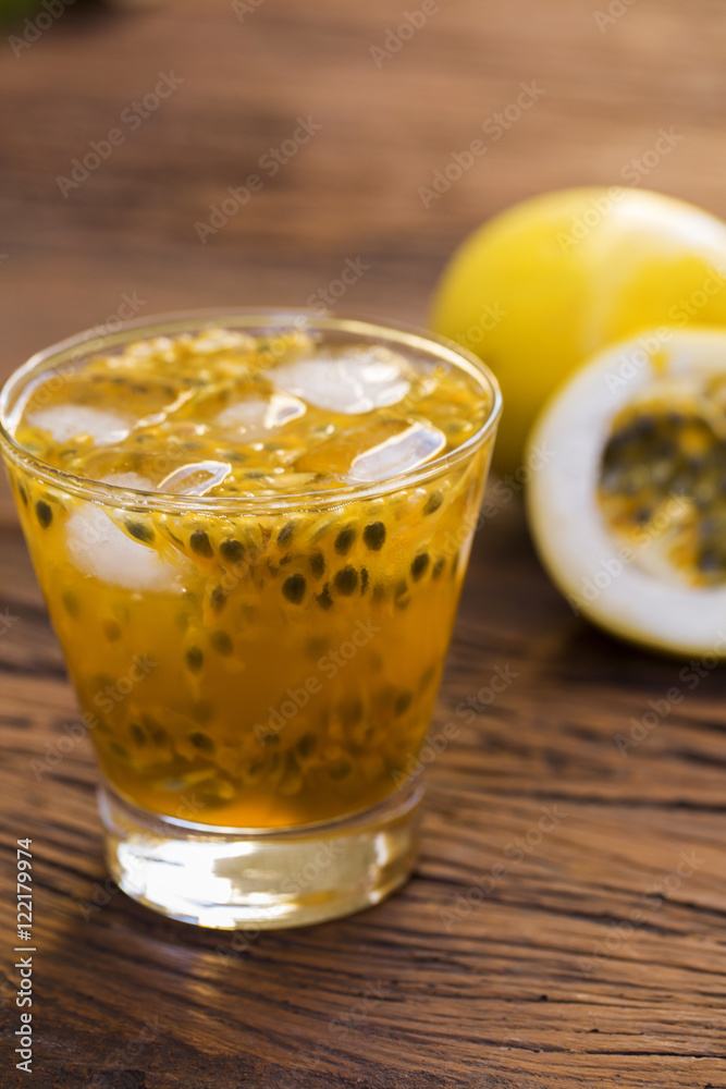Passion Fruit Caipirinha of Brazil on wooden background Passion Fruit Caipirinha of Brazil on wooden background