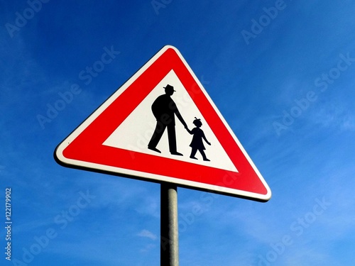 Pedestrians roadsign, parents with child near school, warning traffic sign