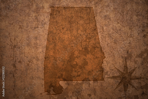alabama state map on a old vintage crack paper background
