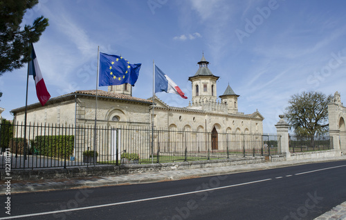 Saint Estephe Bordeaux France - August 2016 - The historic Chateau Cos d'Estournel situated along the wine route of Saint Estephe in the Bordeaux region of France photo