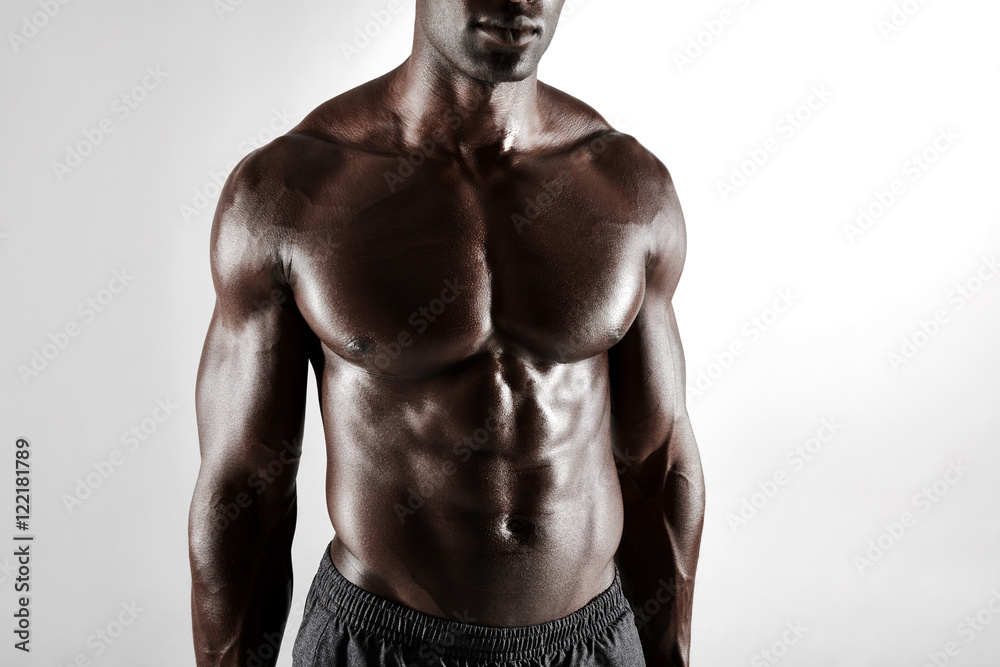 Fototapeta premium Shirtless african man with muscular abs