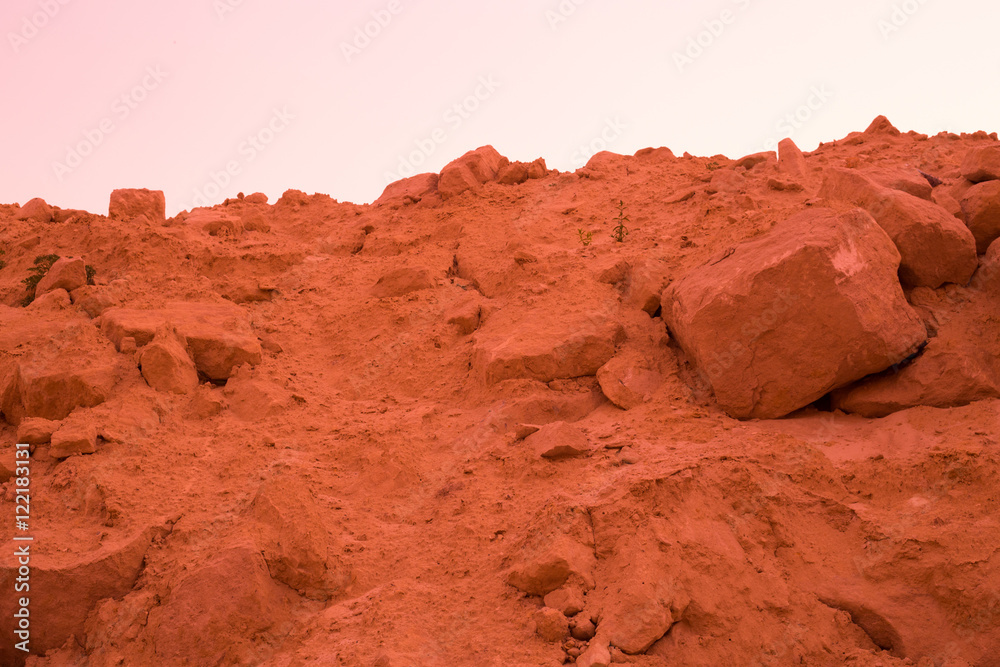 Fototapeta premium The surface of Mars. Deserted terrestial planet in orange colors