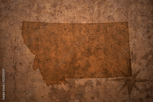Photo montana state map on a old vintage crack paper background