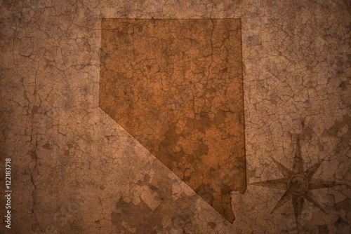 nevada state map on a old vintage crack paper background