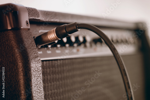 Guitar amplifier with cord plugged in 