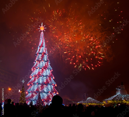 Beautiful Christmas tree and fireworks