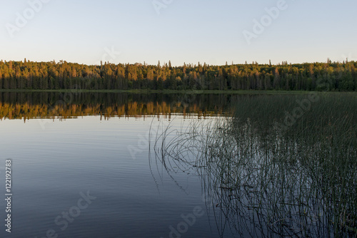Reflection of trees on lake  Lake Audy Campground  Riding Mounta