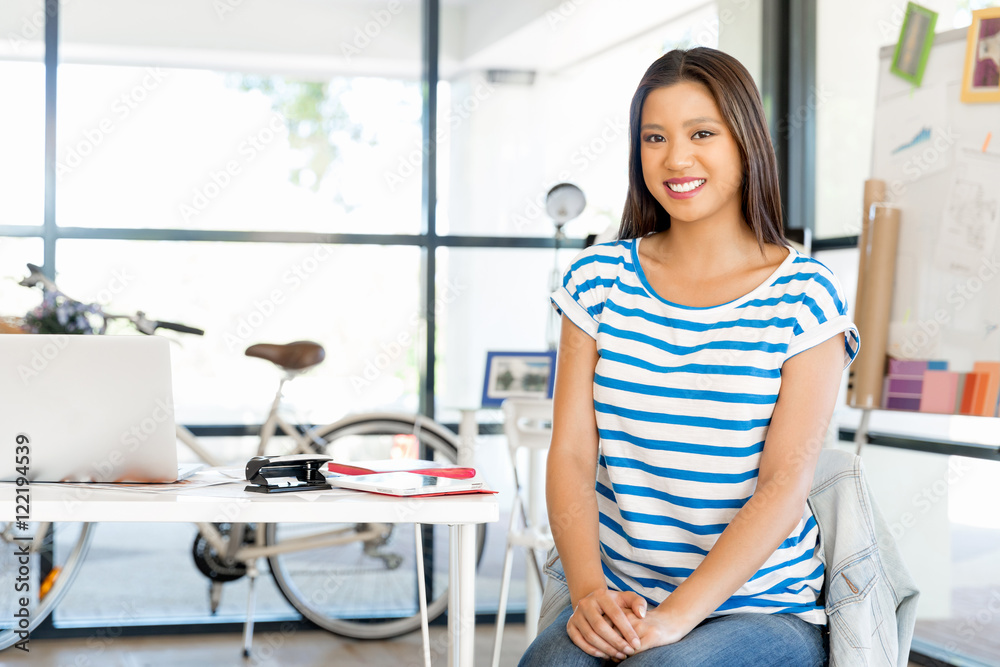 Young woman in office