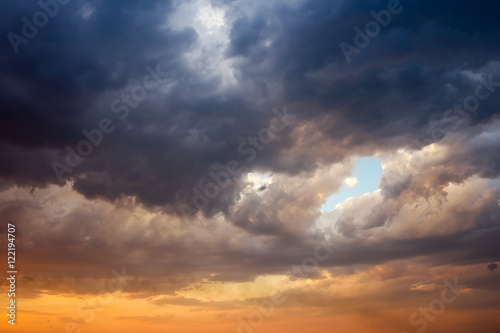 Background of the sky with clouds at sunset
