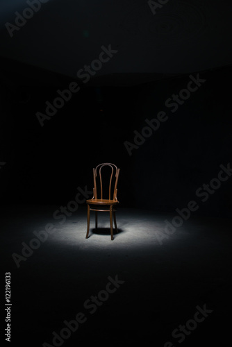 Lonely chair at the empty room