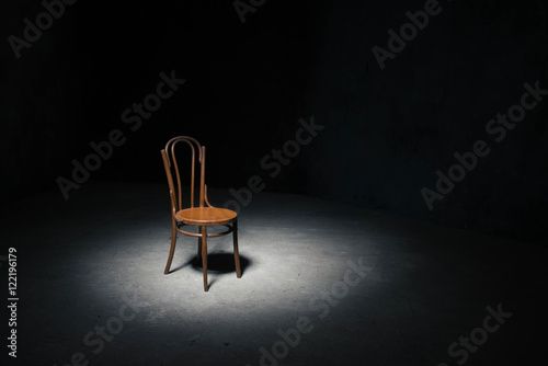 Lonely chair at the empty room