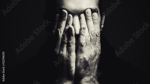 Fototapeta Naklejka Na Ścianę i Meble -  Man With Hands on Face