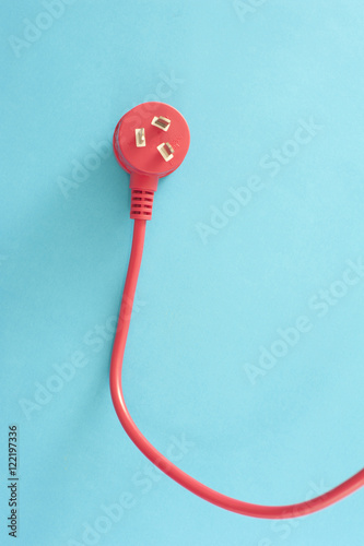 Red electrical lead with integrated plug