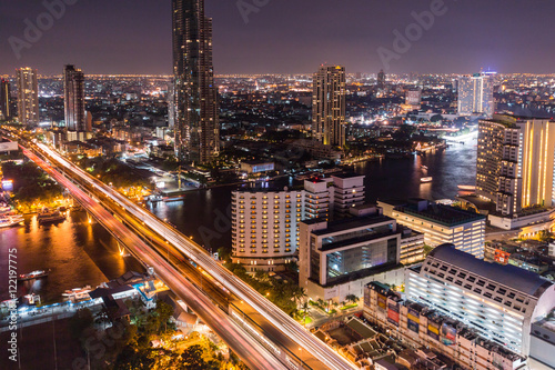 Bangkok Transportation with Modern Business Building along the river (Thailand)