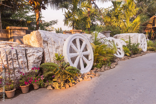 Series of Marble Thammachak (Wheel of Dhamma) , symbol of Buddhisum, Phuket, Thailand photo