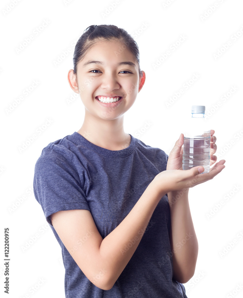 Young happy smiling girl holding a bottle of water Young happy smiling girl holding a bottle of water