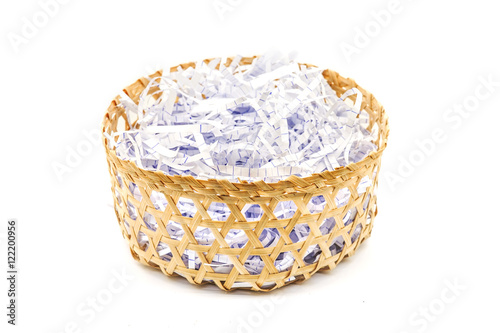 pieces of paper as a bumper in handmade bamboo basket
