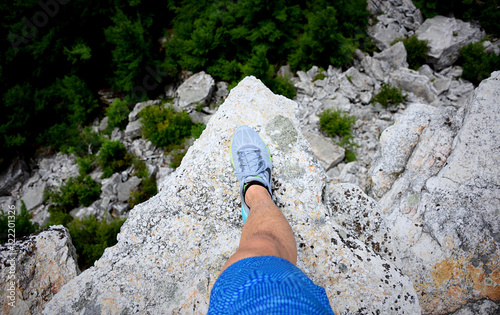Scary thoughts looking over the edge of a cliff