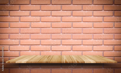 Empty top wooden shelves and brick wall background. For product