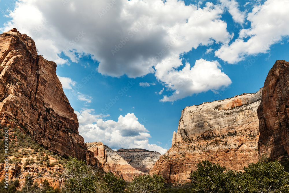 Orange colored rocks with white clouds, Zion National park, Utah, USA