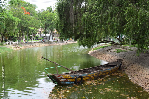 traditional asian fishing boat in river