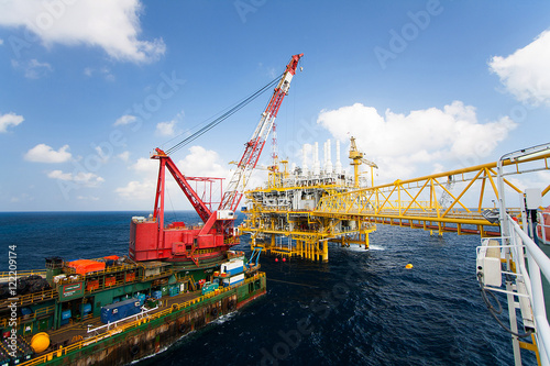 Offshore construction platform for production oil and gas, Oil and gas industry and hard work,Production platform and operation process by manual and auto function, oil and rig industry and operation.