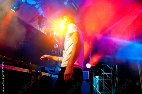 DJ performs at night disco