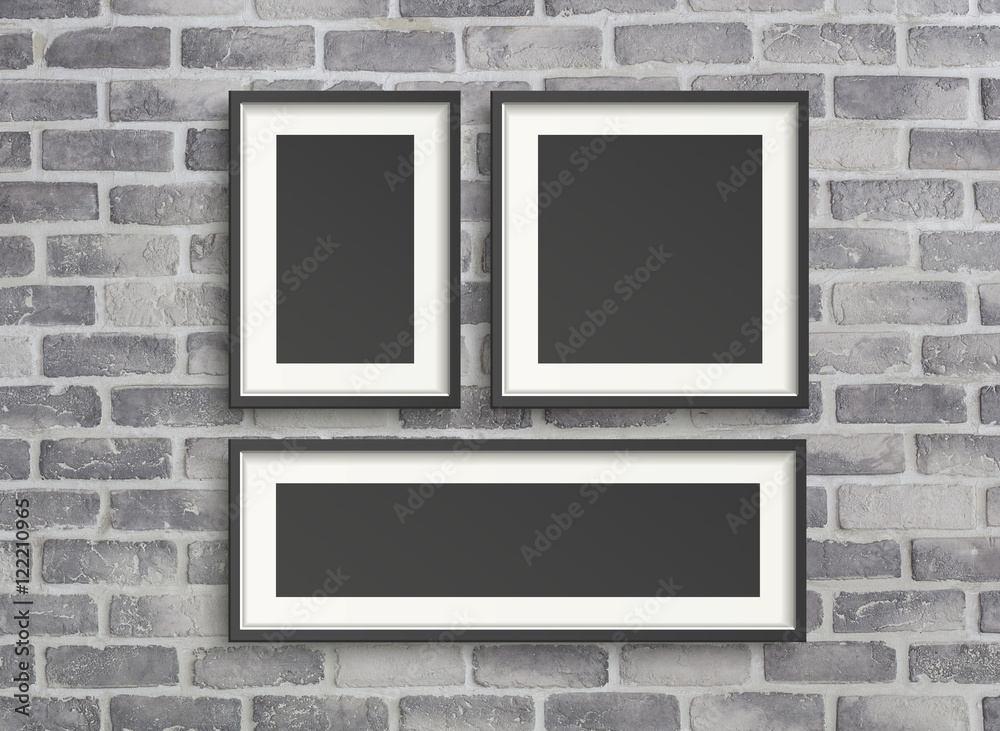 blank frames on grey birck wall blank frames on grey birck wall