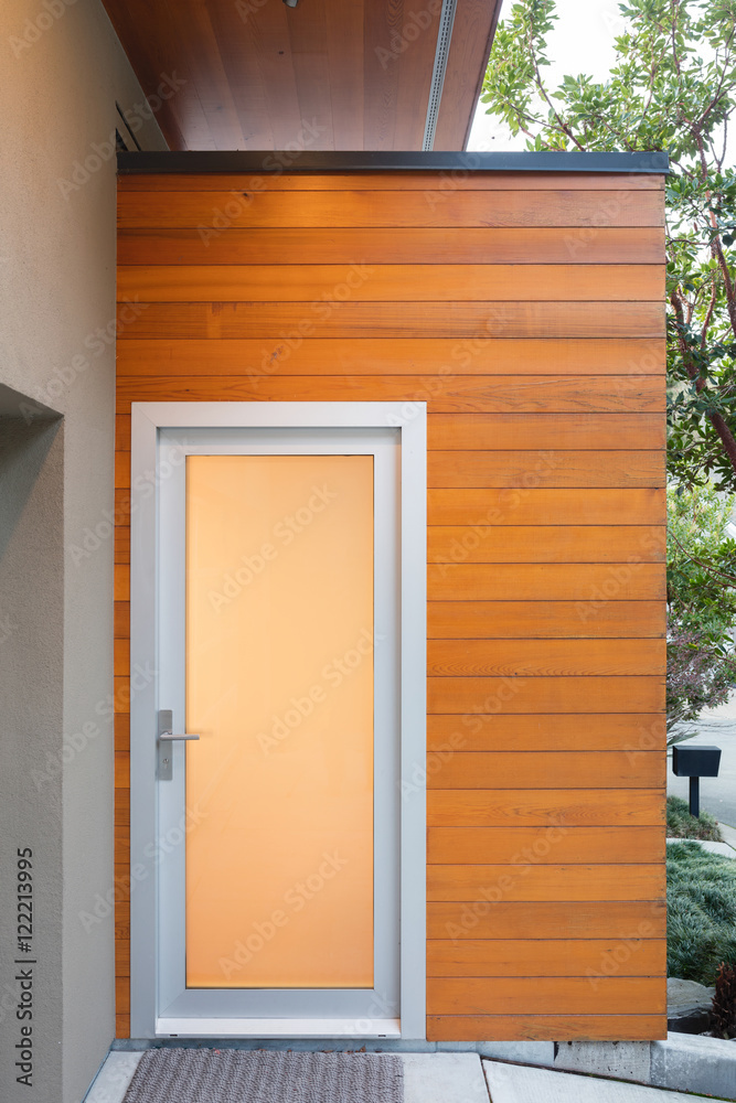 Naklejka premium Modern entry door with frosted glass.