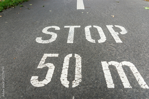 Stop 50 meters on city asphalt on floor