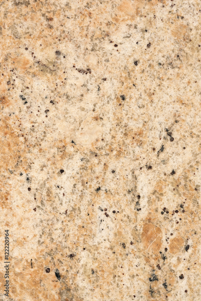 Brown stone with black spots, background, texture Brown stone with black spots, background, texture