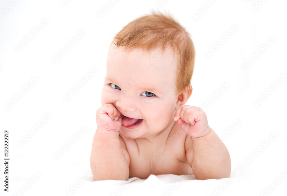 Funny little baby lying down on a blanket . Newborn child relaxing in bed. Nursery for young children. Textile and bedding for kids.
Funny little baby lying down on a blanket . Newborn child relaxing in bed. Nursery for young children. Textile and bedding for kids.
