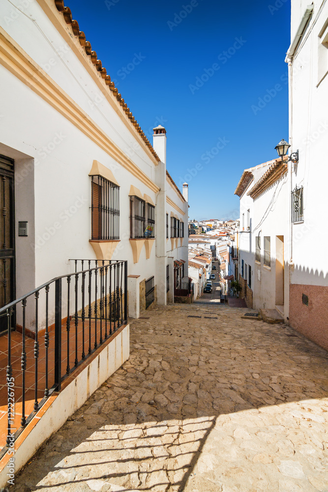 Sunny view of the street in Ronda, Malaga province, Spain.