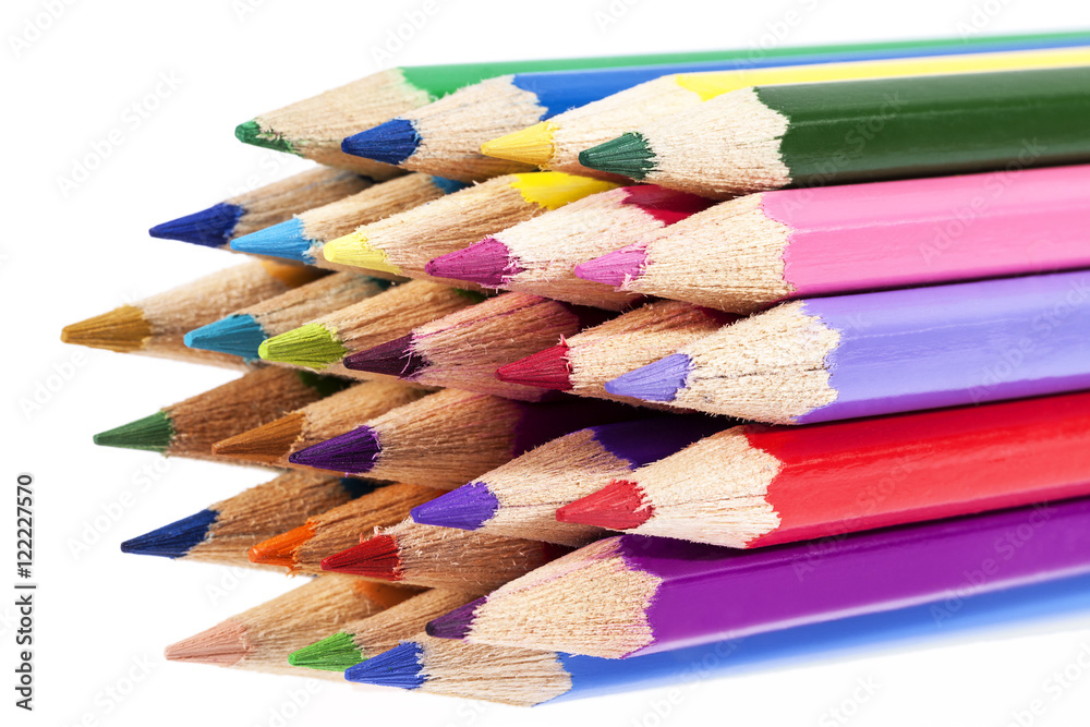 Chipped colored crayons on white background, close up Chipped colored crayons on white background, close up