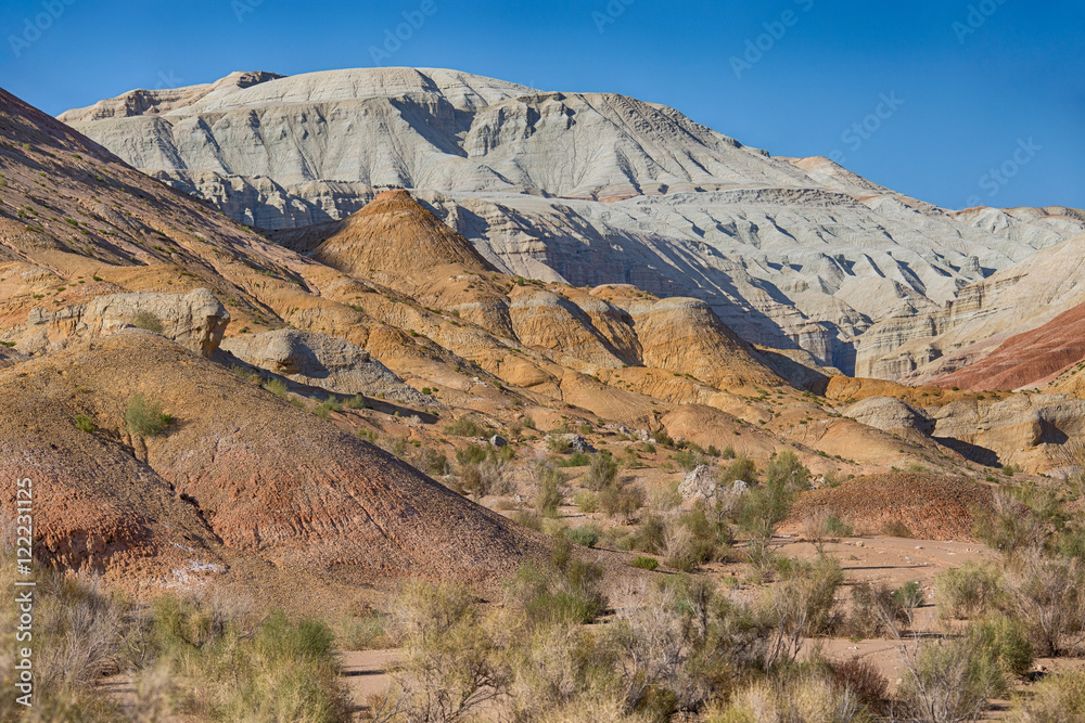 Aktau Mountains in the conservation area of the Altyn Emel Kazakhstan. Yellow mountains and white mountains.