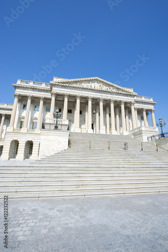 Scenic view of the United States Capitol building in Washington DC, USA from the entrance staircase under clear blue sky