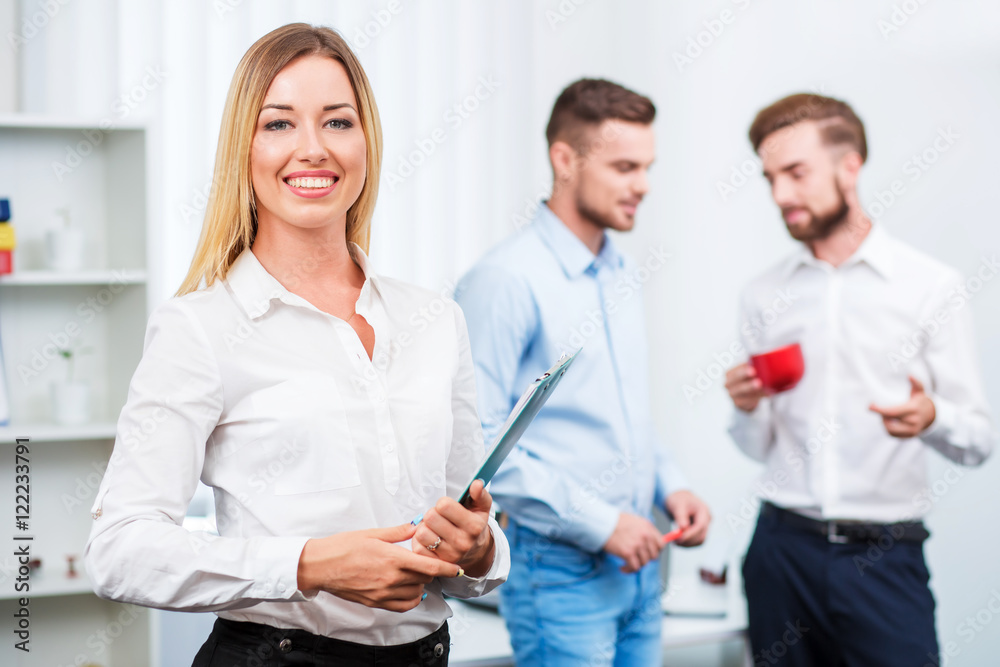 Happy smart business man with team mates Happy smart business man with team mates