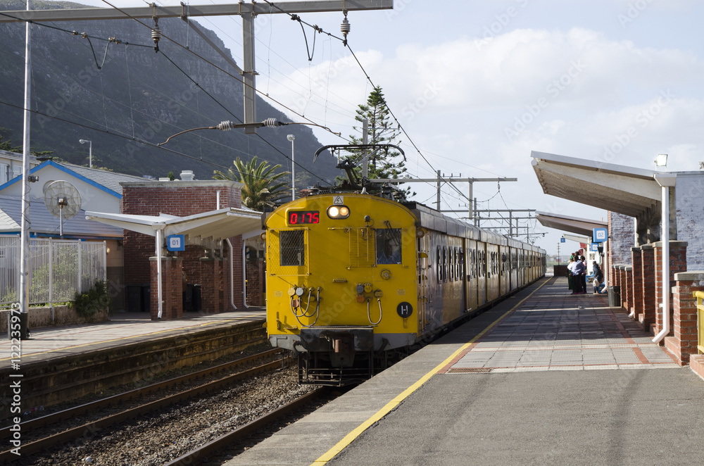Railroad station at Fish Hoek western Cape South Africa - April 2016 - A suburban railroad train standing at the platform in Fish Hoek Railroad station at Fish Hoek western Cape South Africa - April 2016 - A suburban railroad train standing at the platform in Fish Hoek