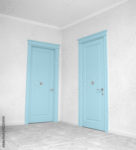 Close up of closed wooden door in the empty room