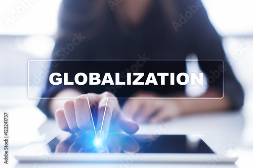 Woman is using tablet pc, pressing on virtual screen and selecting "Globalization".