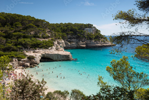 Cala Mitjana in a sunny summer day