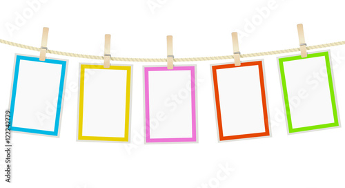 photo frames hanging on a rope with clothespins. vector